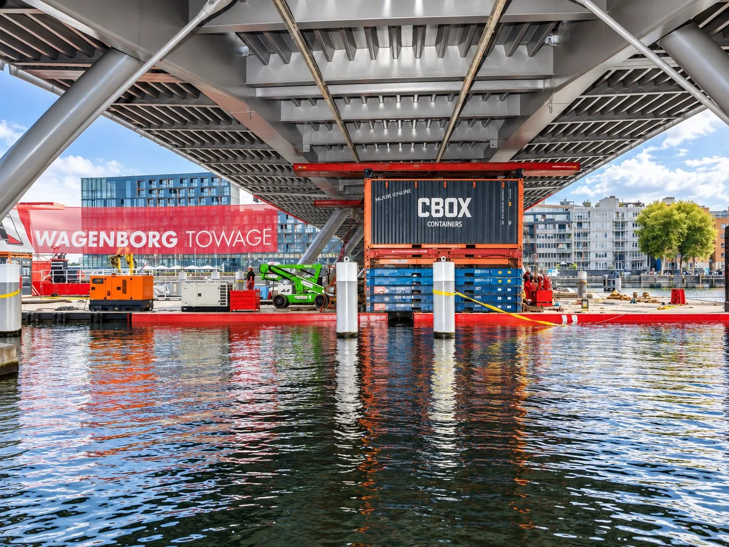 CBOX shipping container and flatracks supporting a Jan Schaefer Bridge section on a pontoon for SAIL Amsterdam 2025