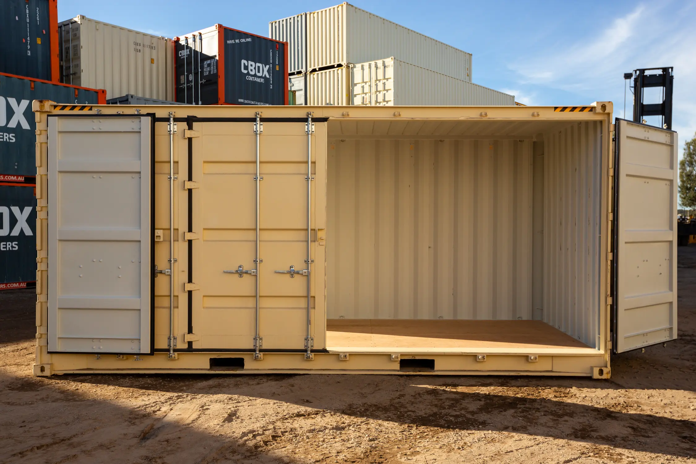 Stacked shipping containers in a logistics yard