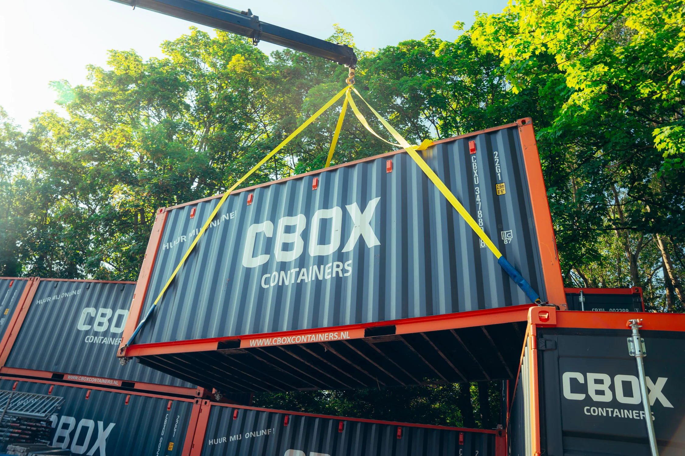 CBOX containers stacked in a depot
