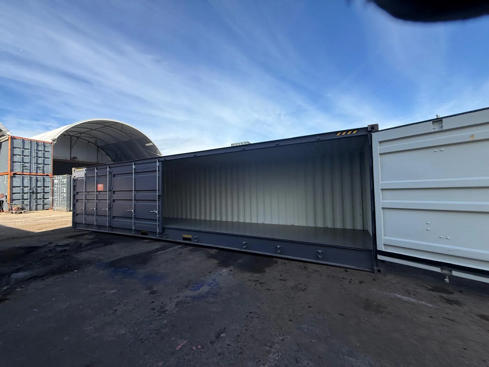 CBOX containers stacked in a depot